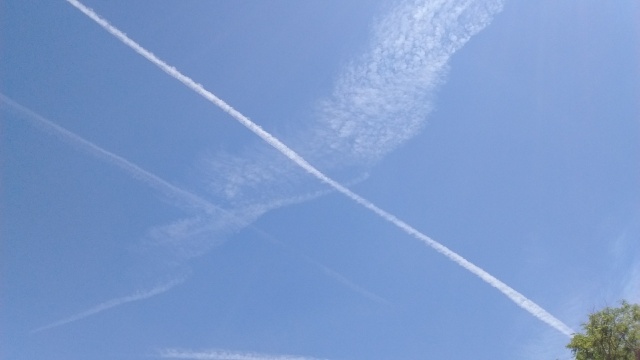 Aeroplane tracks in a blue sky