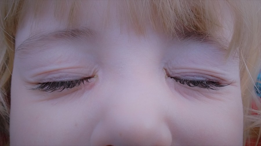 Child's closed eyes in close up